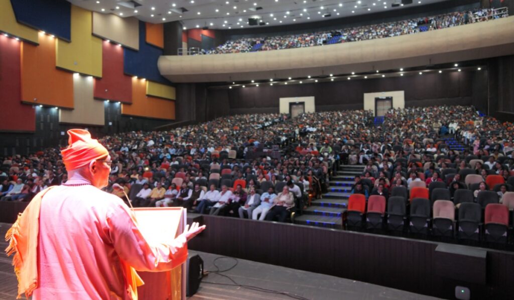 Swami Nikhileshwarananda Maharaj (President of Ramakrishna Math, Rajkot) delivering speech